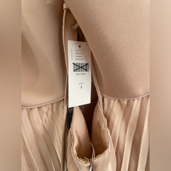 ANTHROPOLOGIE WILLCOCKS
ACLER PLEATED ASYMMETRIC MIDI DRESS - Picture 12 of 16